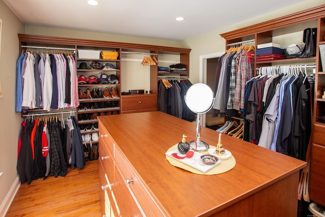 spacious closet featuring light wood finished floors