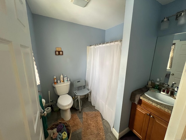 full bathroom with toilet, baseboards, visible vents, and vanity