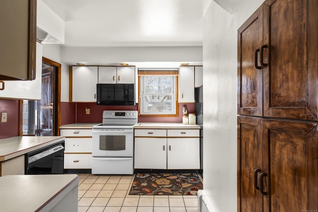 kitchen featuring black appliances, light tile patterned floors, white cabinetry, and light countertops