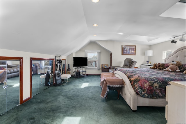 carpeted bedroom with vaulted ceiling and baseboards