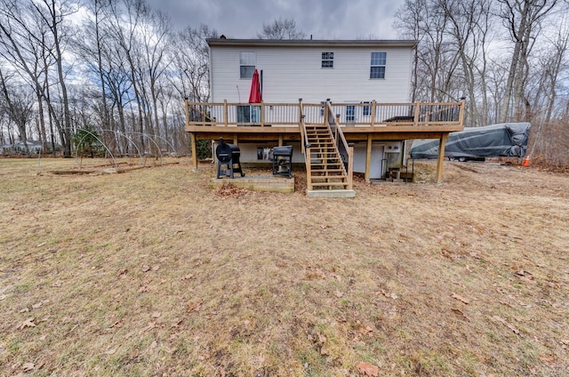 rear view of house with a deck and stairway