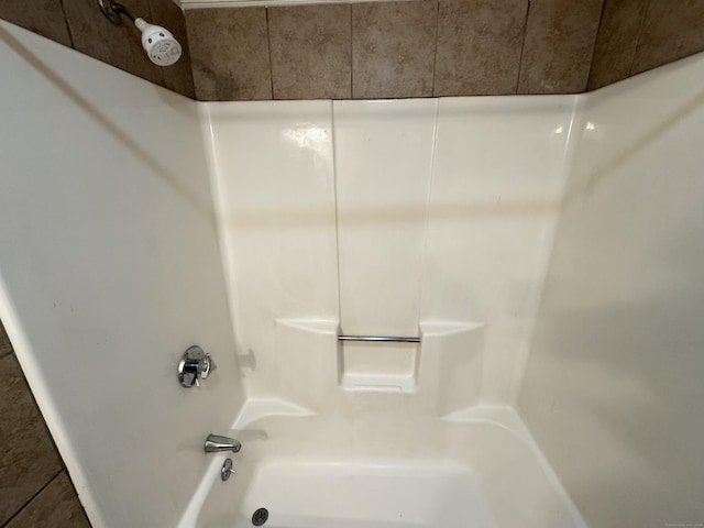 bathroom with shower / bathing tub combination