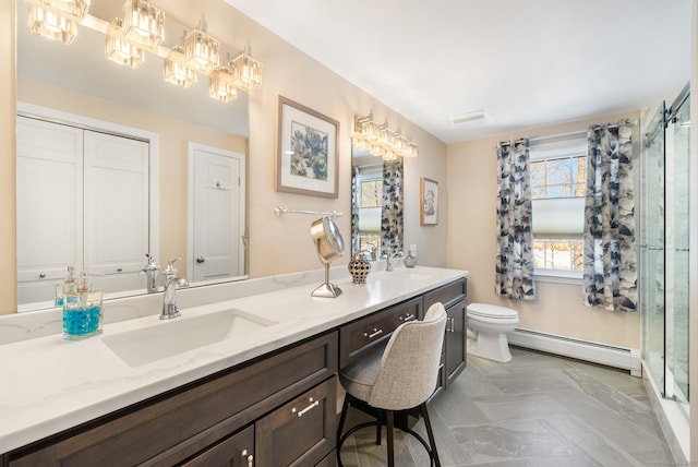 full bathroom featuring a baseboard radiator, toilet, a sink, a closet, and double vanity