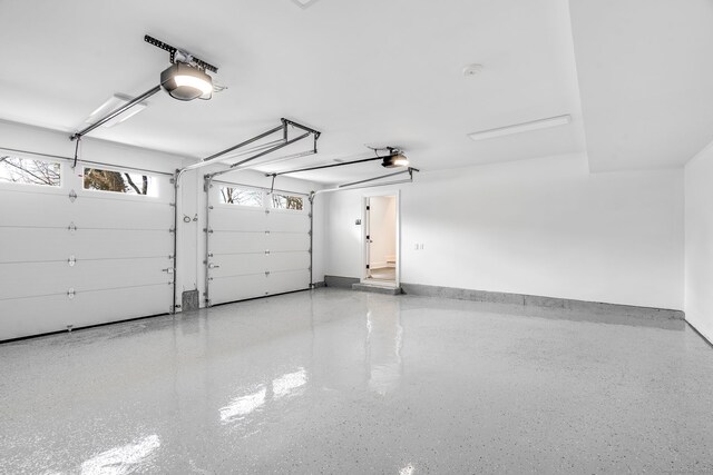 25 Henry St Unit B, Greenwich, CT 06830 - garage with a garage door opener