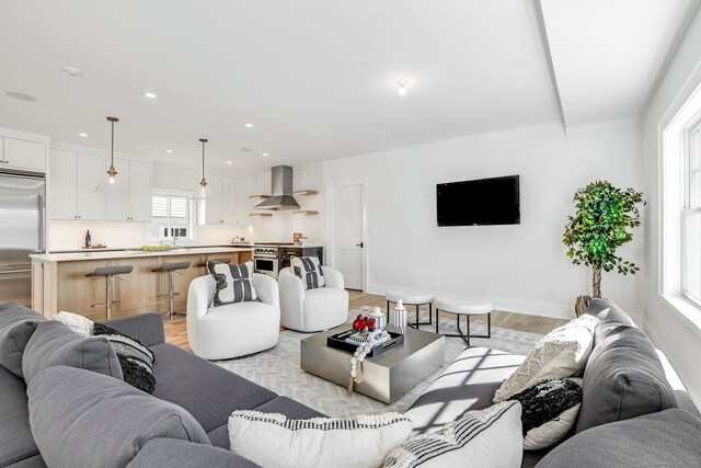 25 Henry St Unit B, Greenwich, CT 06830 - living room with recessed lighting, baseboards, and light wood-type flooring