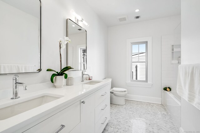 25 Henry St Unit B, Greenwich, CT 06830 - full bath featuring double vanity, visible vents, toilet, and a sink