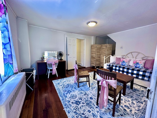 interior space with radiator, dark wood-style floors, baseboard heating, and crown molding