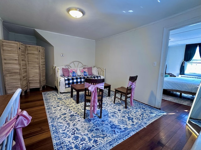 interior space featuring dark wood-type flooring and crown molding