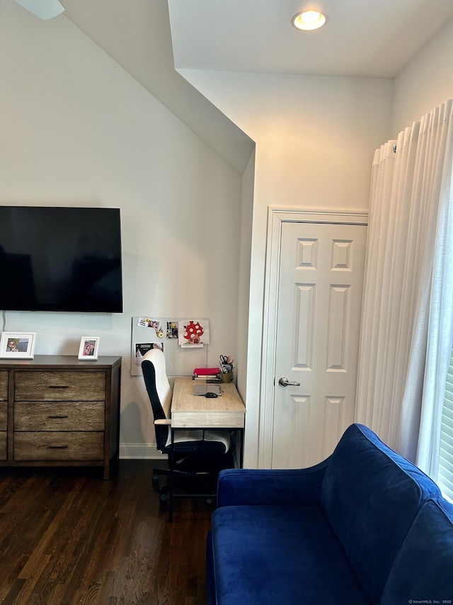 bedroom with dark wood-style floors