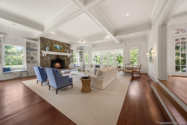 262 Brushy Ridge Rd, New Canaan, CT 06840 - living room featuring a stone fireplace, beamed ceiling, crown molding, wood finished floors, and healthy amount of natural light