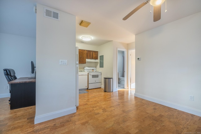 kitchen with brown cabinets, visible vents, electric range, electric panel, and baseboards