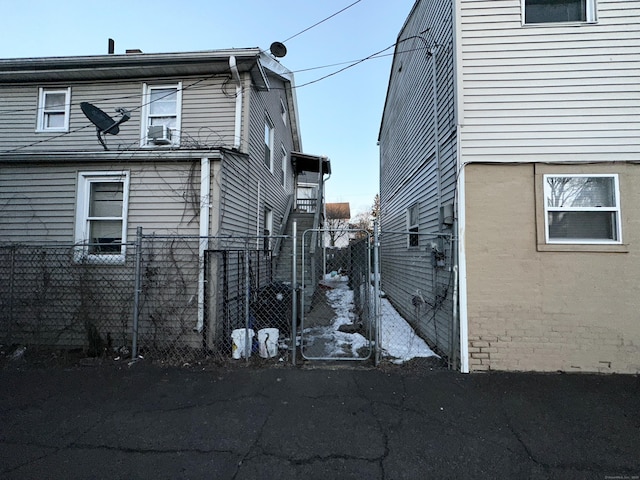 view of side of property with fence