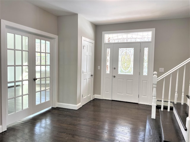 157R Sumner Wood Rd, Durham, CT 06422 - entrance foyer with baseboard heating, french doors, baseboards, dark wood-style flooring, and stairway
