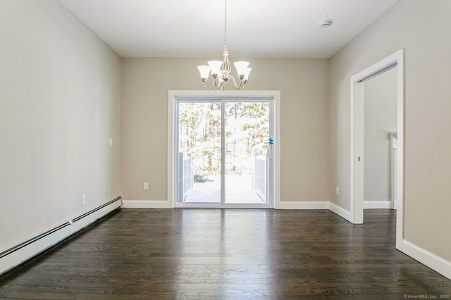 unfurnished room featuring dark wood-style floors, a baseboard radiator, baseboards, and a notable chandelier