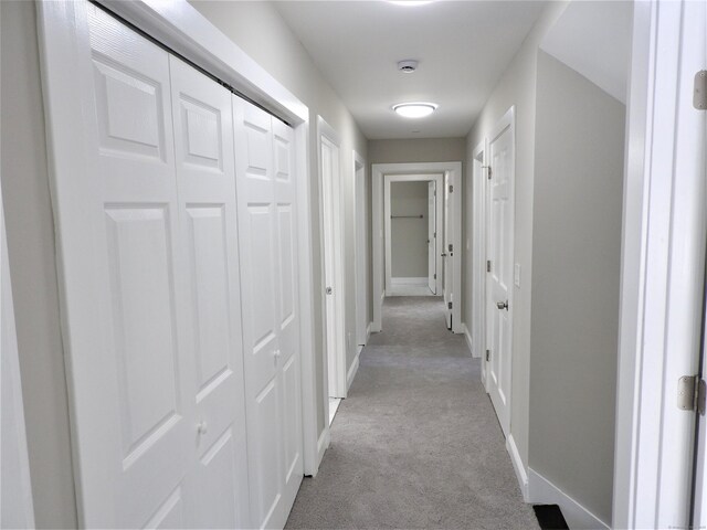 157R Sumner Wood Rd, Durham, CT 06422 - hall with baseboards and carpet floors
