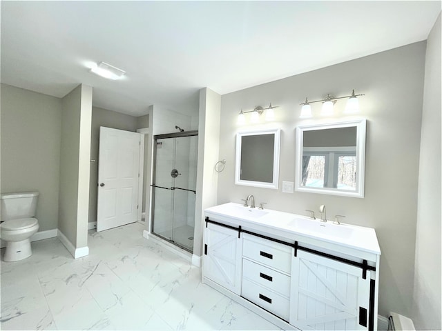 bathroom featuring baseboards, marble finish floor, a sink, and a shower stall