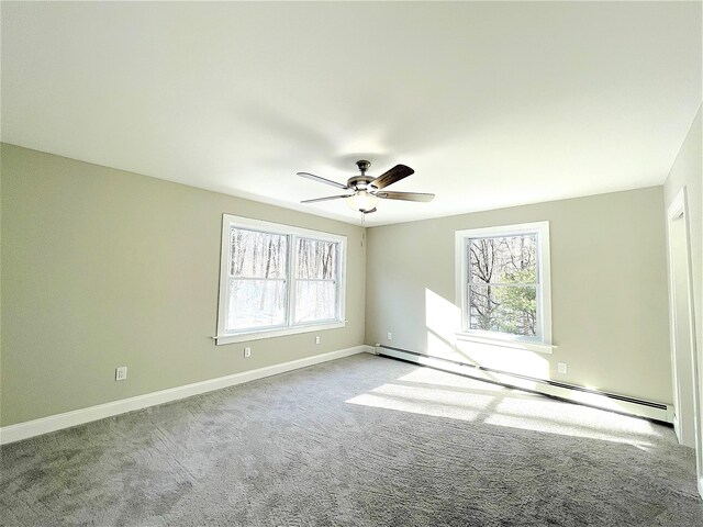 157R Sumner Wood Rd, Durham, CT 06422 - empty room featuring baseboard heating, baseboards, a ceiling fan, and carpet floors