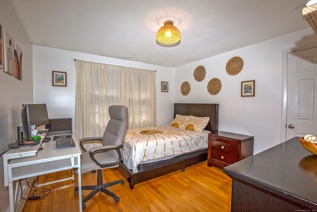 bedroom featuring light wood finished floors