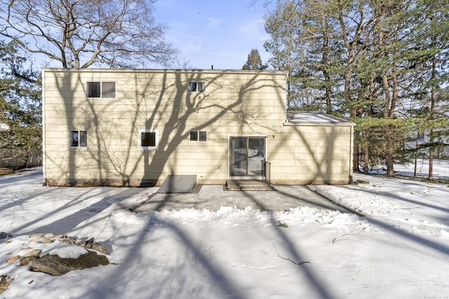 view of snow covered property