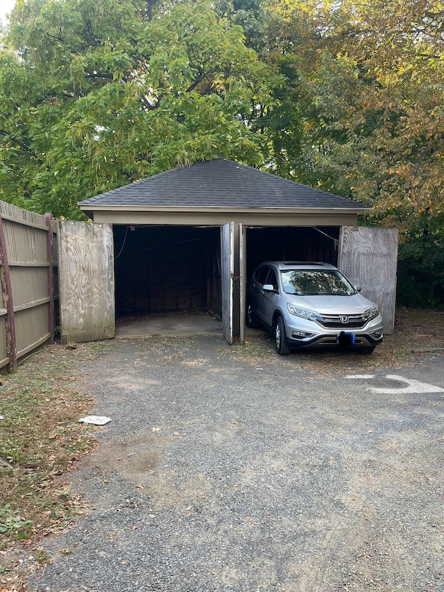 detached garage with fence