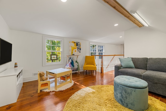 living room with vaulted ceiling with beams, recessed lighting, visible vents, wood finished floors, and baseboards