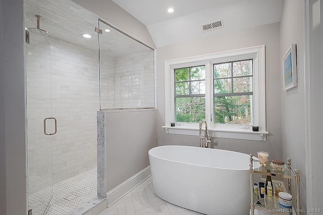 full bath with a freestanding tub, recessed lighting, visible vents, baseboards, and a stall shower