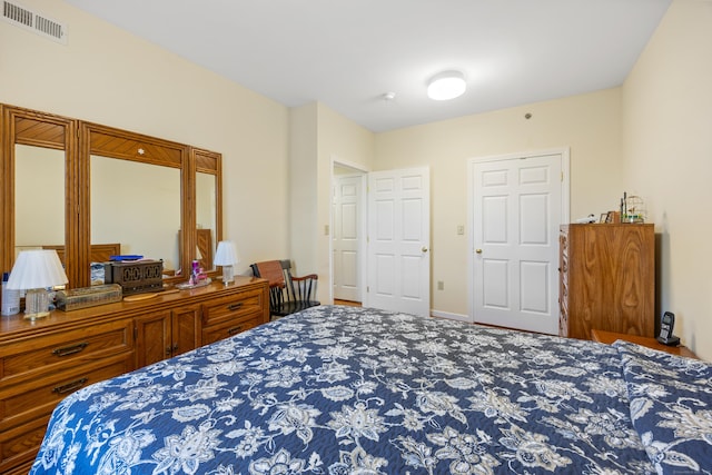 bedroom with visible vents