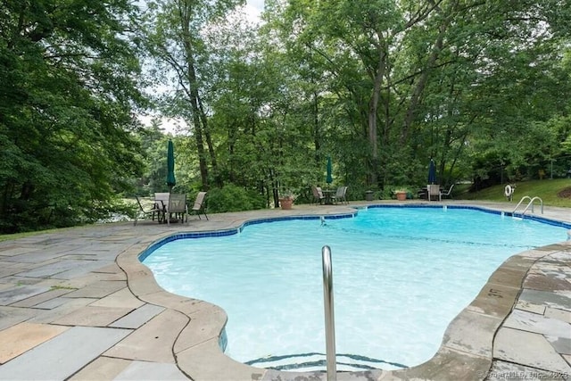 pool featuring a patio