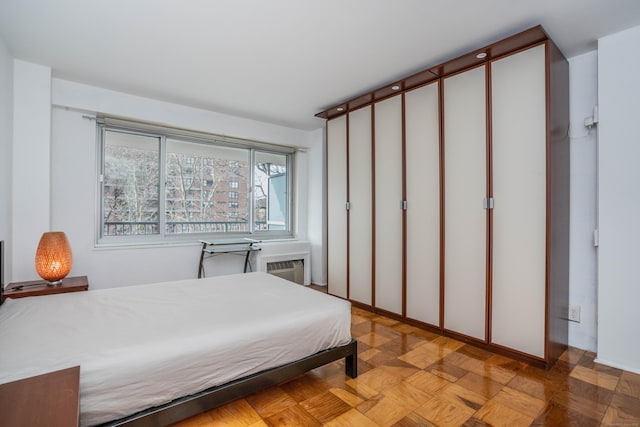 bedroom with a wall mounted air conditioner