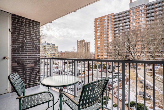 balcony featuring a city view