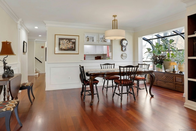 dining room featuring dark wood-style floors, recessed lighting, and crown molding