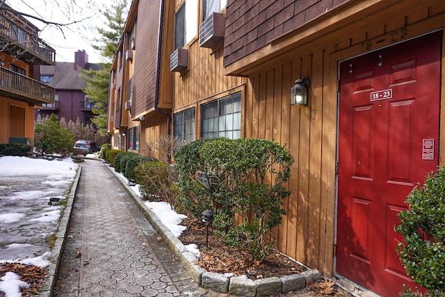 entrance to property with a wall mounted AC