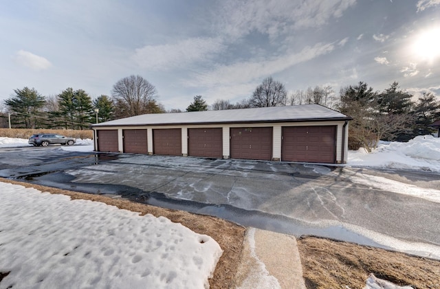 view of snow covered garage