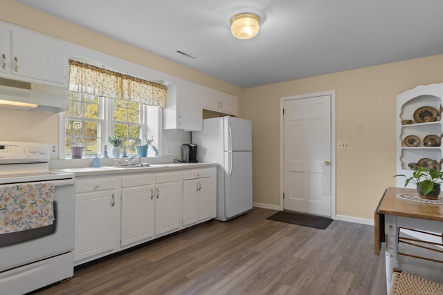 kitchen featuring under cabinet range hood, white appliances, a sink, white cabinetry, and light countertops