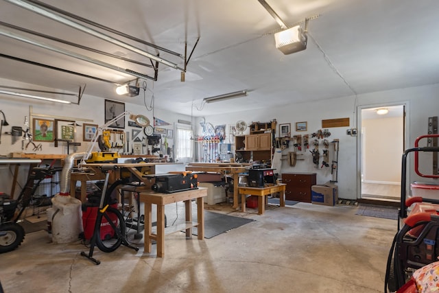 garage featuring a workshop area and a garage door opener