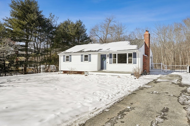 view of front of home with a chimney