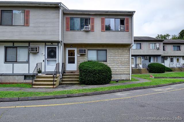 view of property featuring entry steps