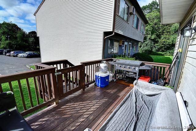 wooden deck with area for grilling