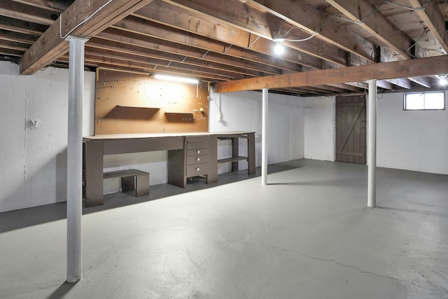 basement featuring a workshop area