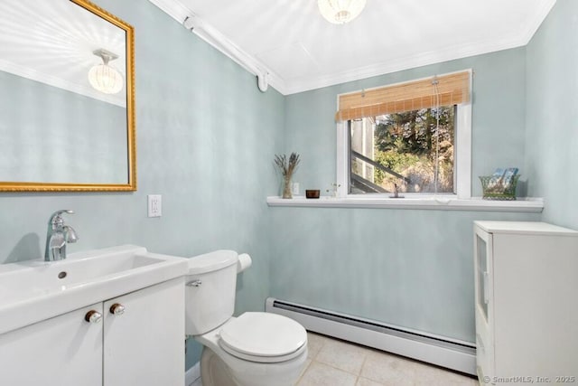 half bathroom featuring a baseboard heating unit, toilet, vanity, and crown molding