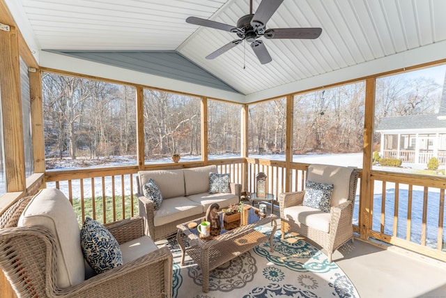 sunroom / solarium featuring vaulted ceiling and ceiling fan