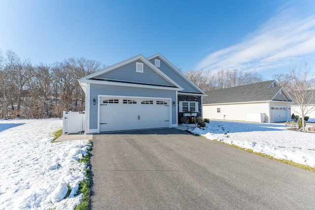 view of front of home with a garage and driveway