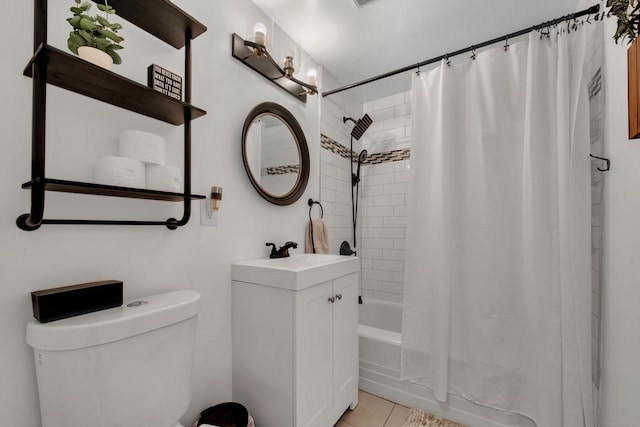 full bathroom with shower / tub combo, vanity, toilet, and tile patterned floors