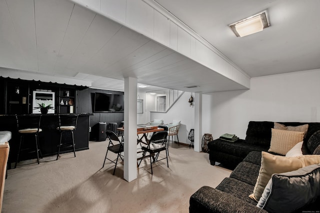 dining room featuring visible vents and a dry bar