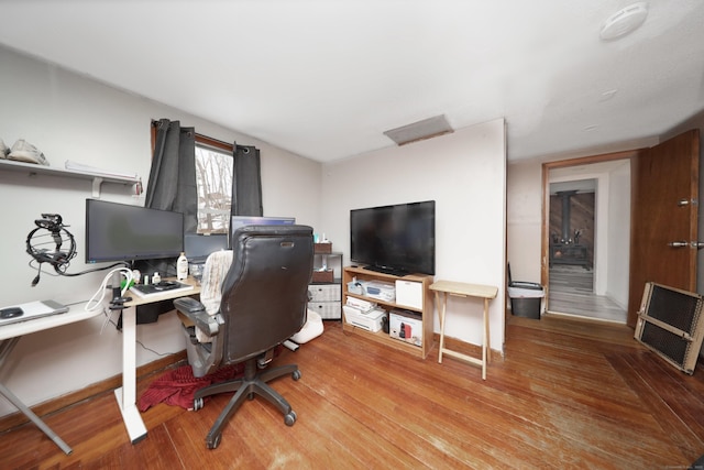 office area featuring baseboards and wood finished floors