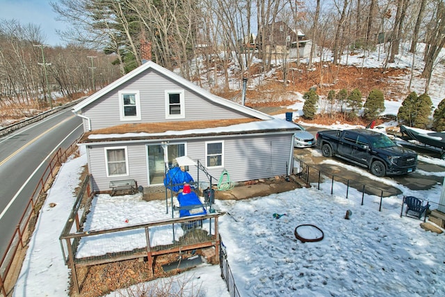 view of snow covered property