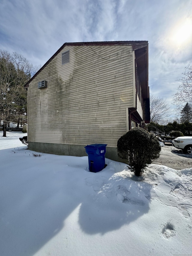 view of snow covered property