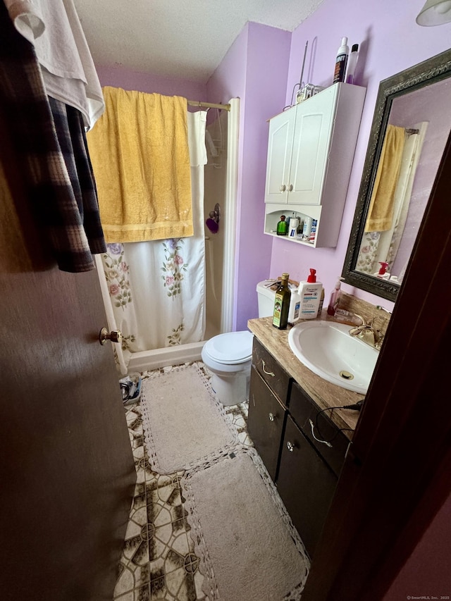 full bath featuring toilet, a shower with curtain, tile patterned floors, and vanity