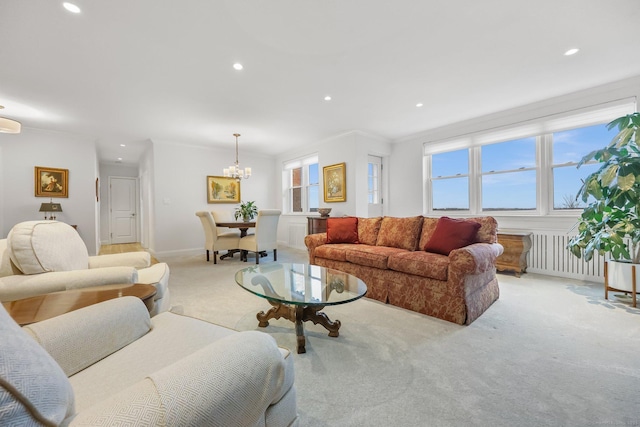 living area with recessed lighting, radiator, light carpet, and a healthy amount of sunlight