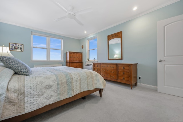 bedroom featuring recessed lighting, light colored carpet, a ceiling fan, baseboards, and crown molding